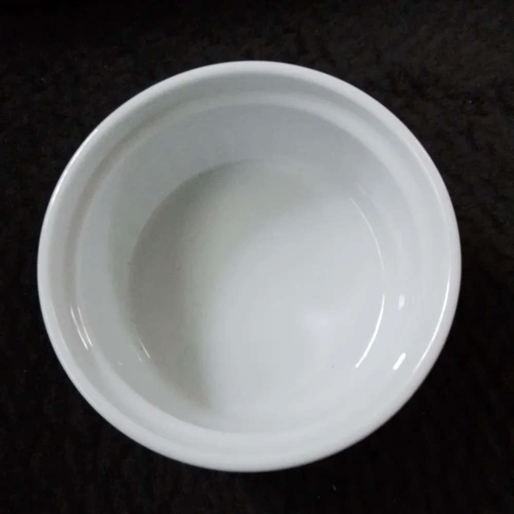 White ramekin with rooster lid